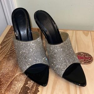 Rhinestone covered black slip on open toe heel